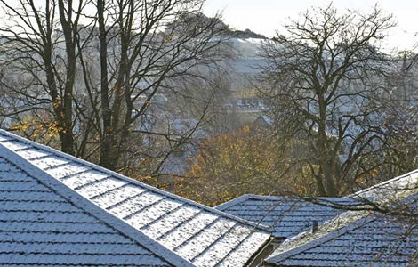 Snow on Roof Tops by David Packman